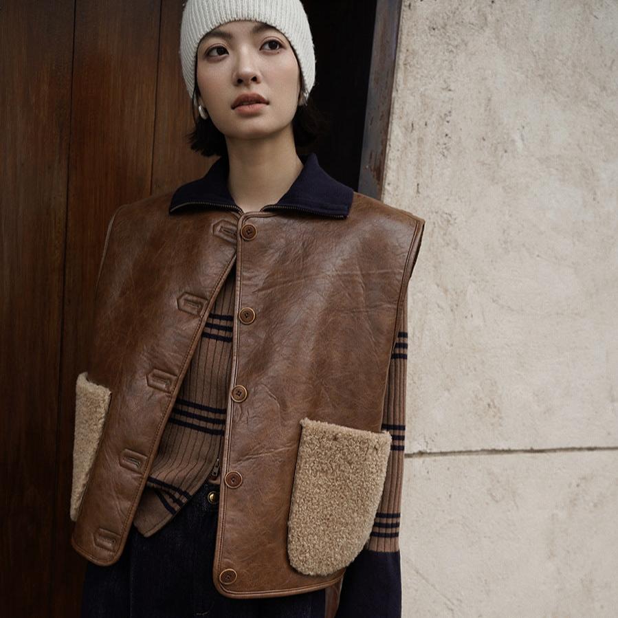 Reversible sleeveless jacket