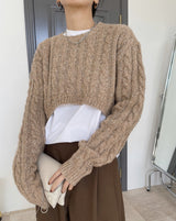 Cropped cable knit sweater