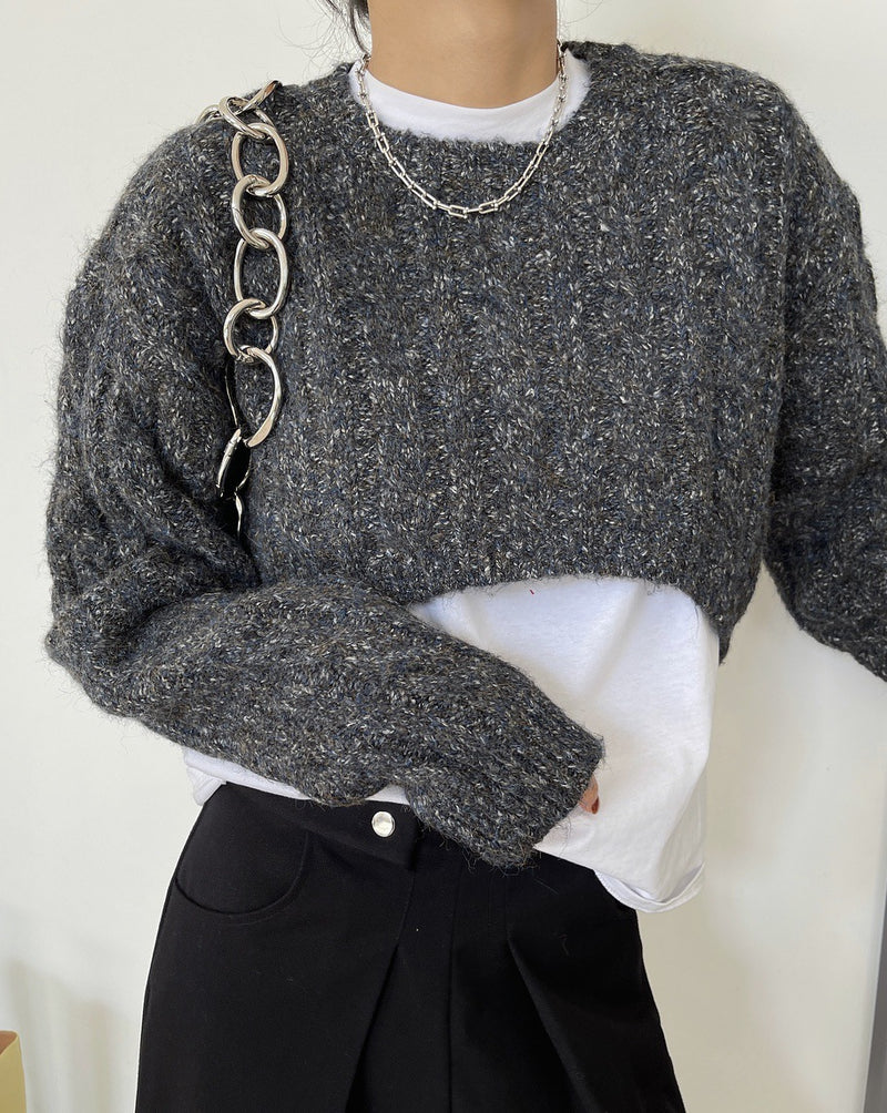 Cropped cable knit sweater