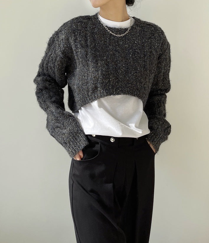 Cropped cable knit sweater