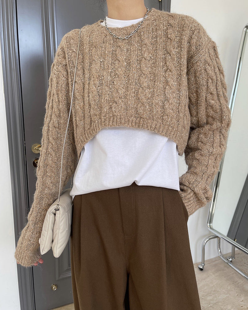 Cropped cable knit sweater