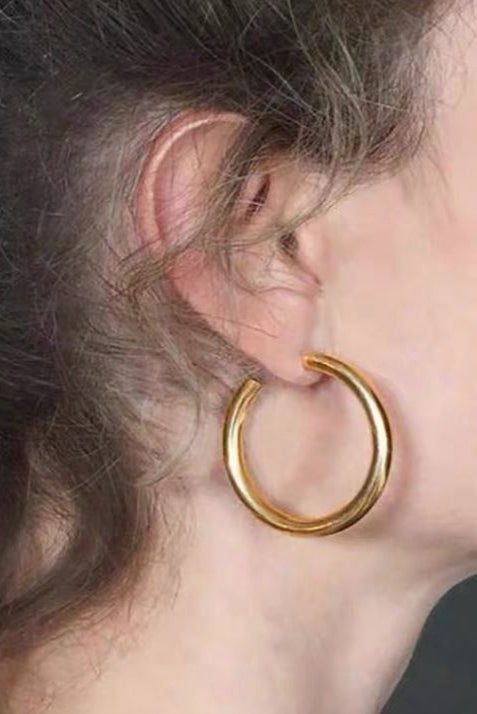 Simple hoop pierce